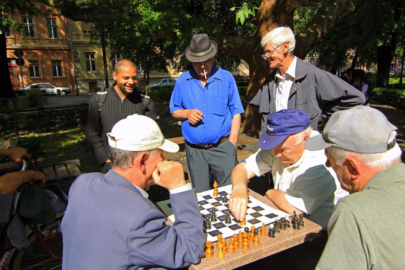 Local senior people play chess in the streets in the medieval city of  Sibiu.Transylvania.Romania Stock Photo - Alamy