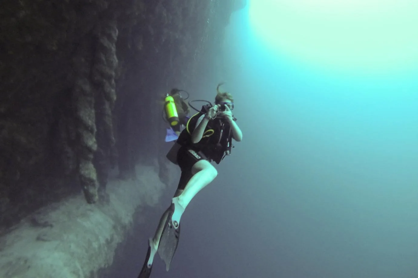 Where else in the world can you swim in and out of stalactites in murky blue water?