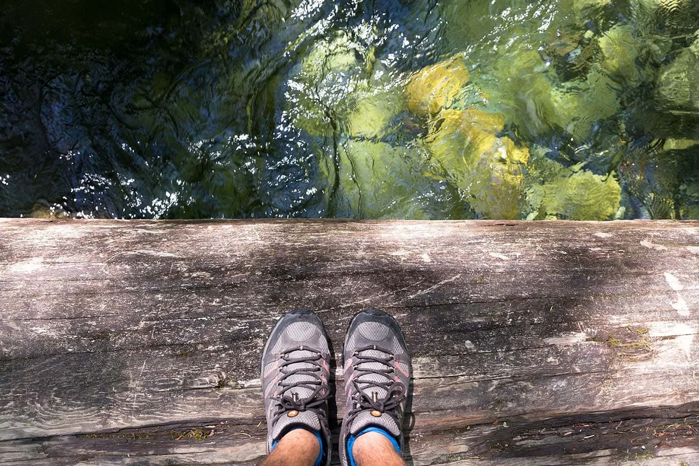 Walking over one of the log bridges at Shannon Falls