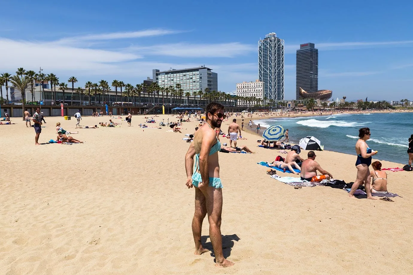 Man in a bikini on Barceloneta Beach