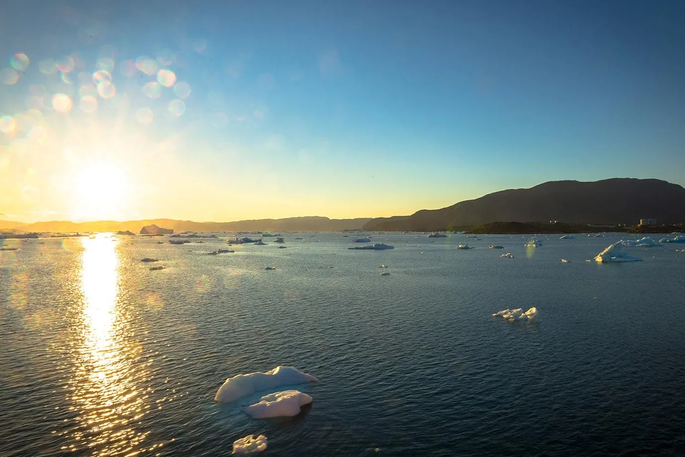 Sunset over icebergs