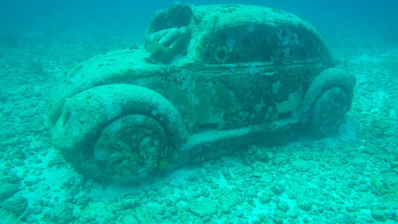 I quite liked this statue but I couldn't help but think an actual car would've been more powerful musa underwater sculpture museum