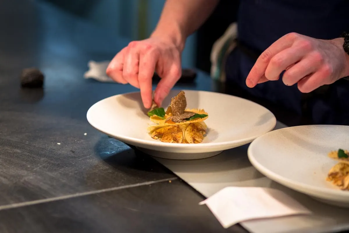 preparing food at restaurant marcus