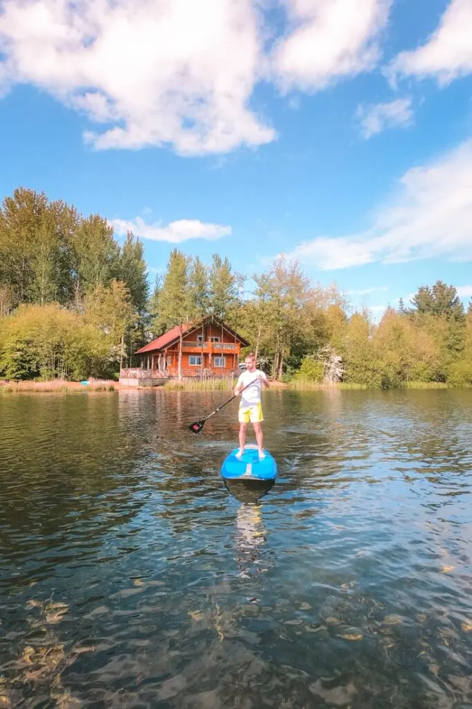paddleboarding log house holidays