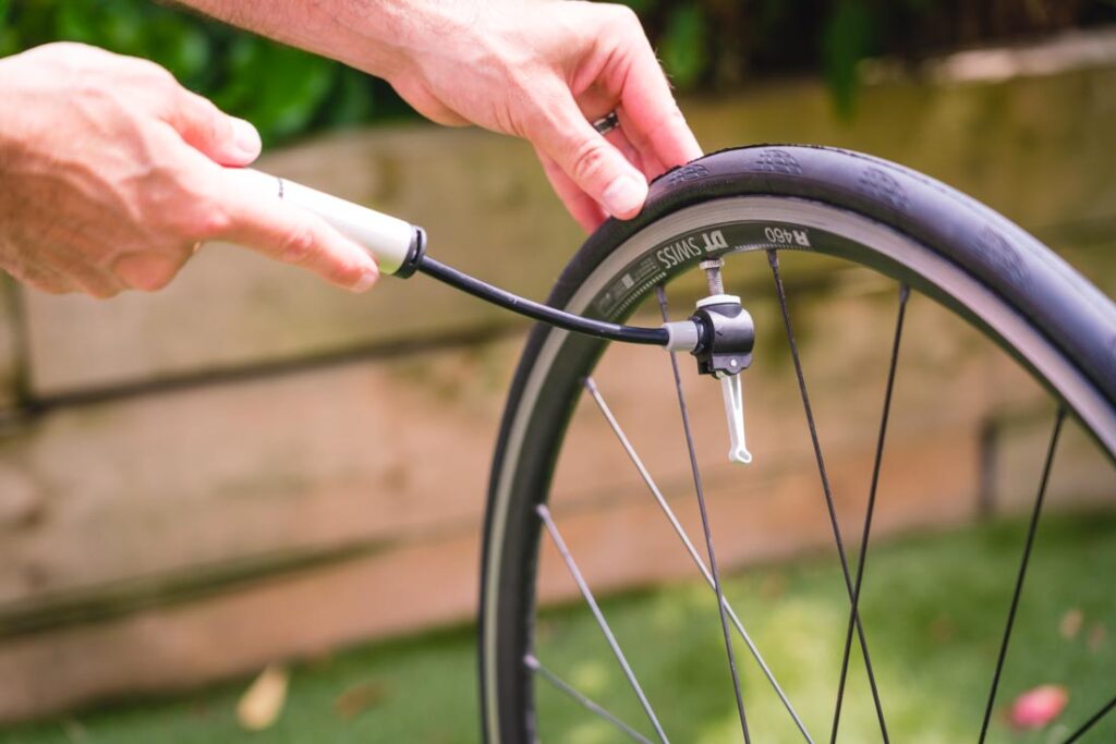 pumping up a tire