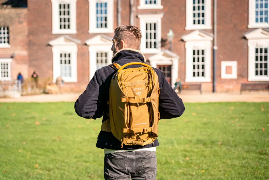 how to wear a backpack