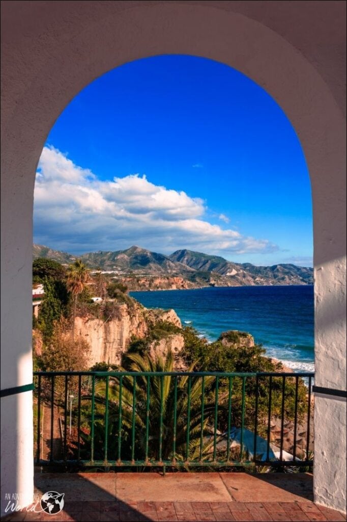 archway overlooking the sea in malaga