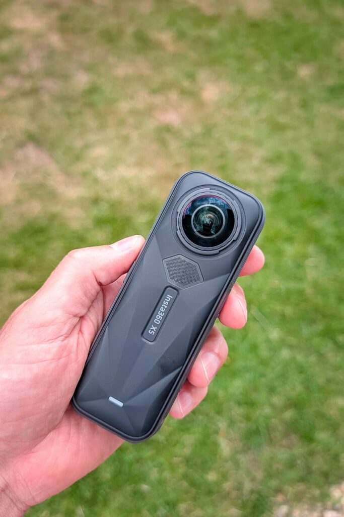 holding the insta360 x5