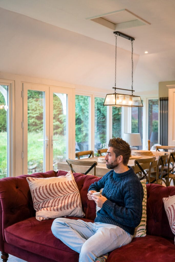 man relaxing at holiday home